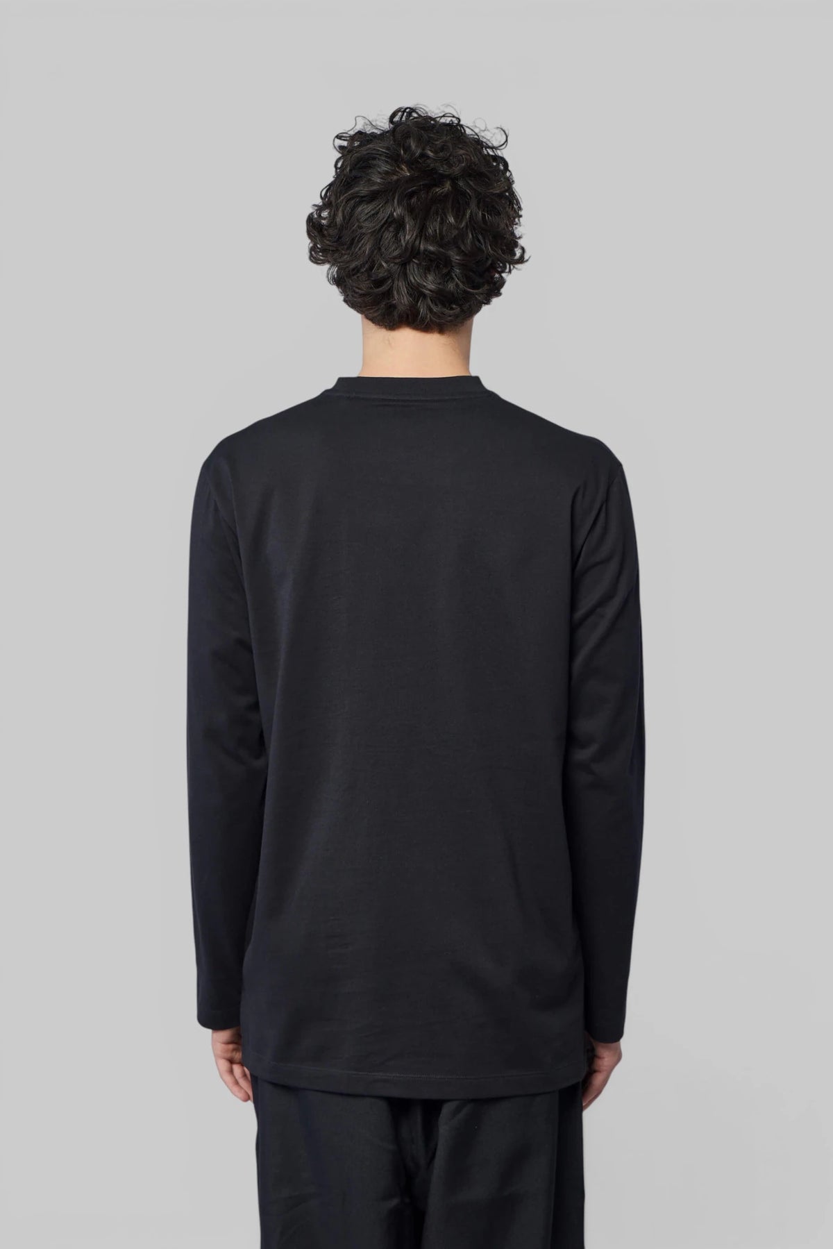 Y-3 Yohji Yamamoto long-sleeve tee styled for modern casual wear