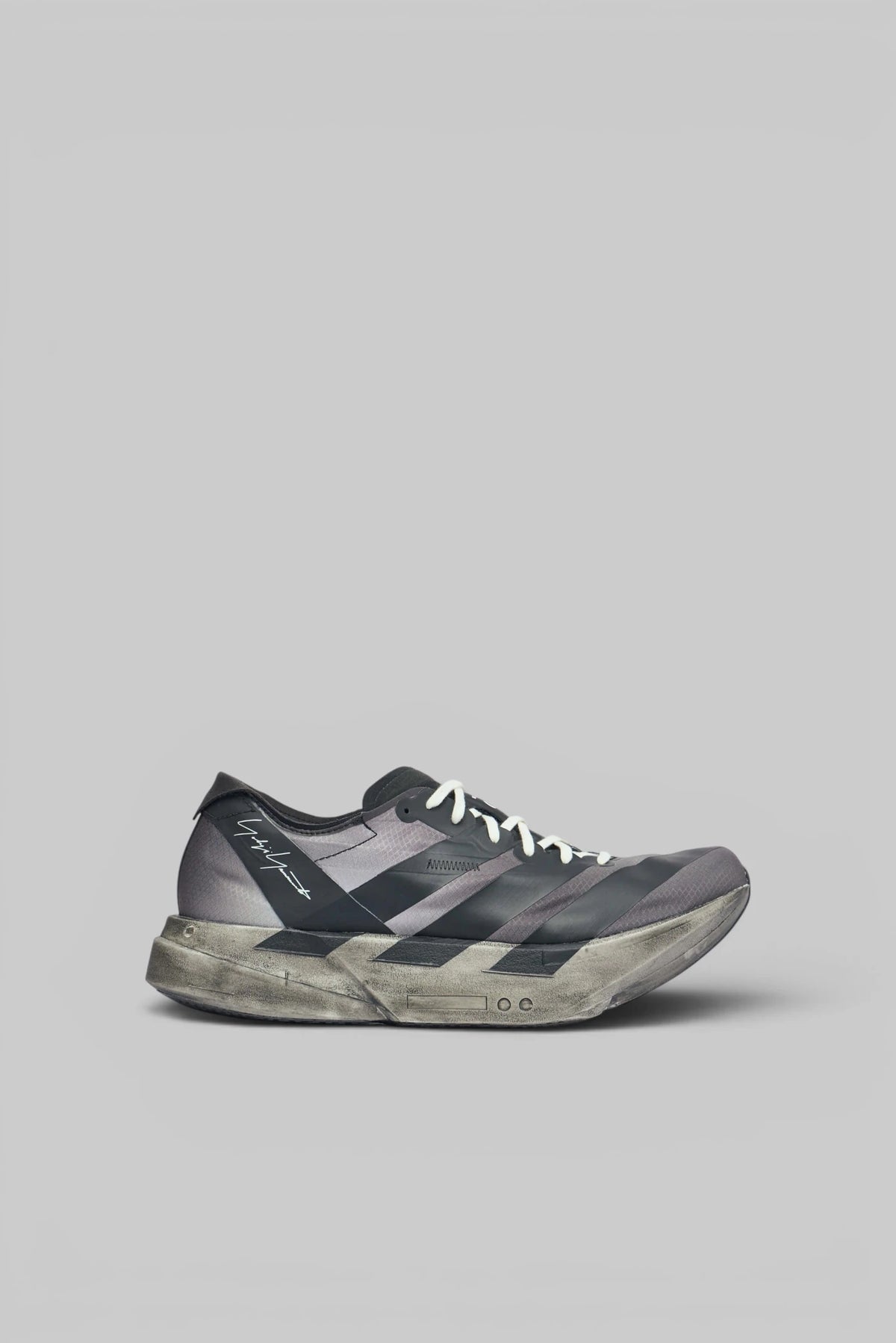 Y-3 Yohji Yamamoto Low Top Sneakers in black and grey with signature branding