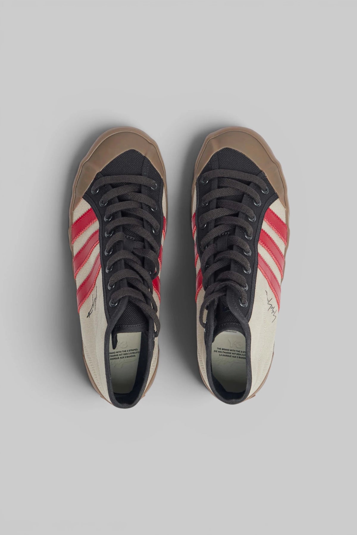 Close-up of red stripe and contrast stitching on Y-3 sneaker