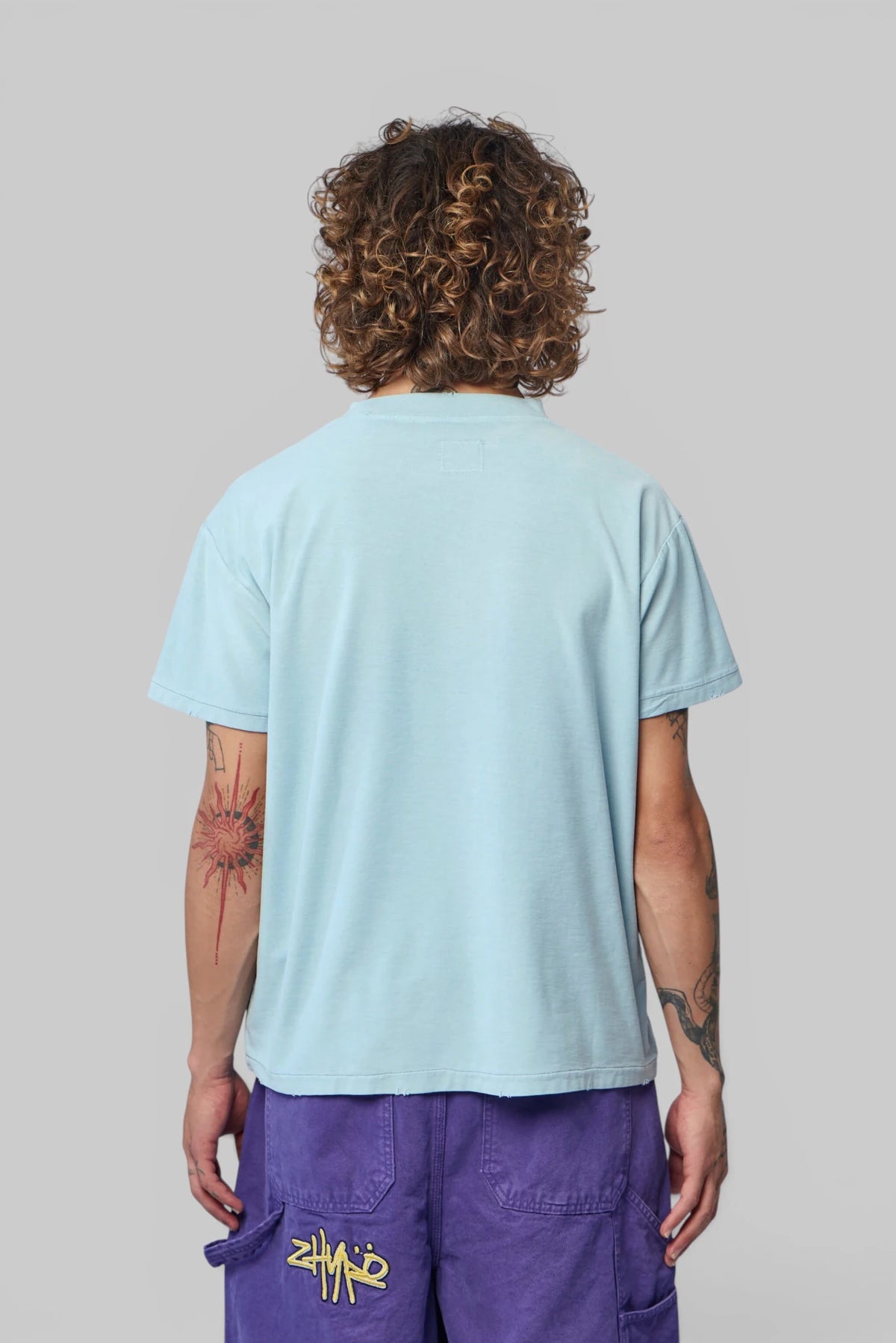 Back detail of Zhyro Horsey Tee crew neck and loose fit