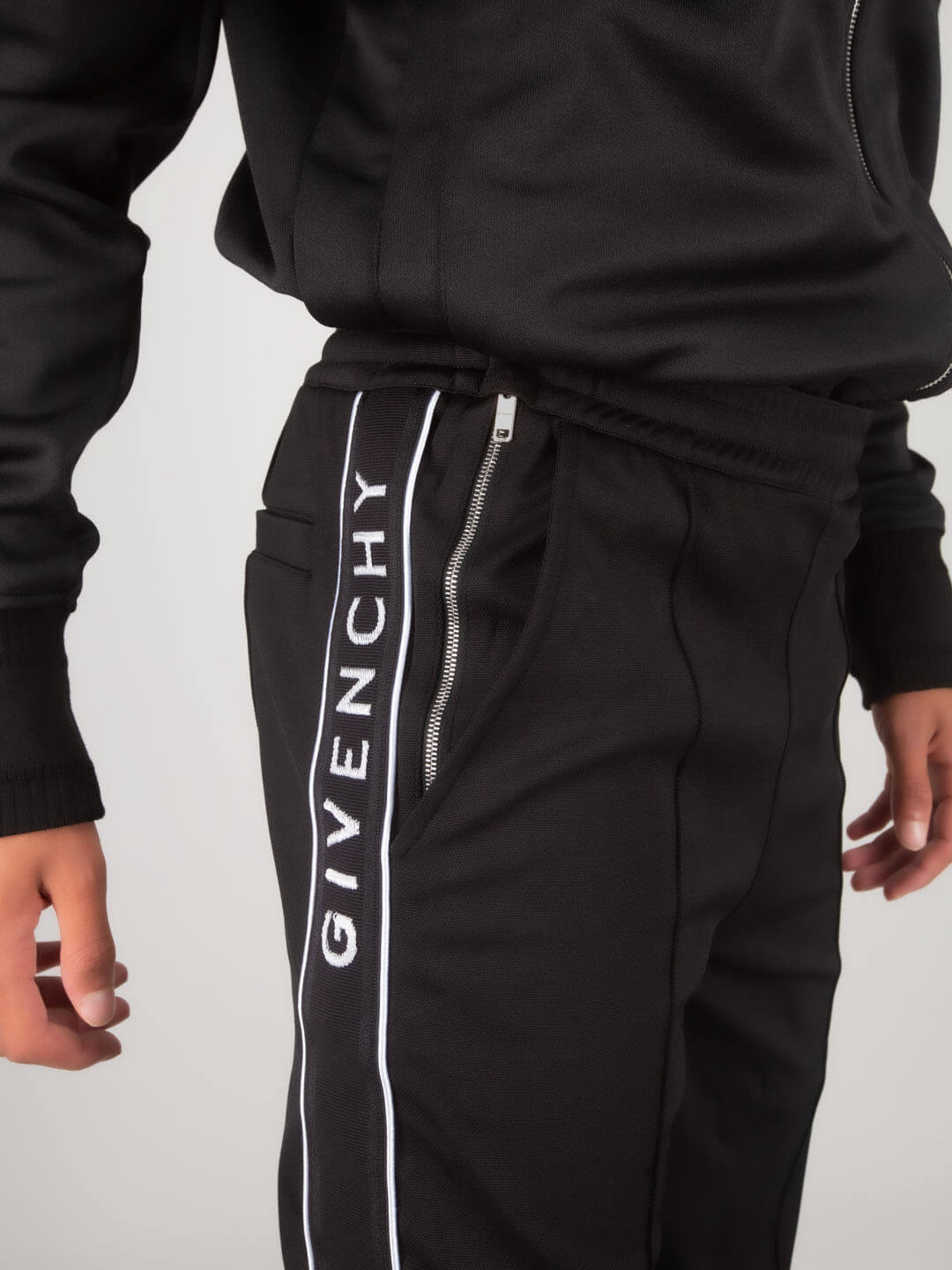 GIVENCHY Track pants with tuxedo stripes in black