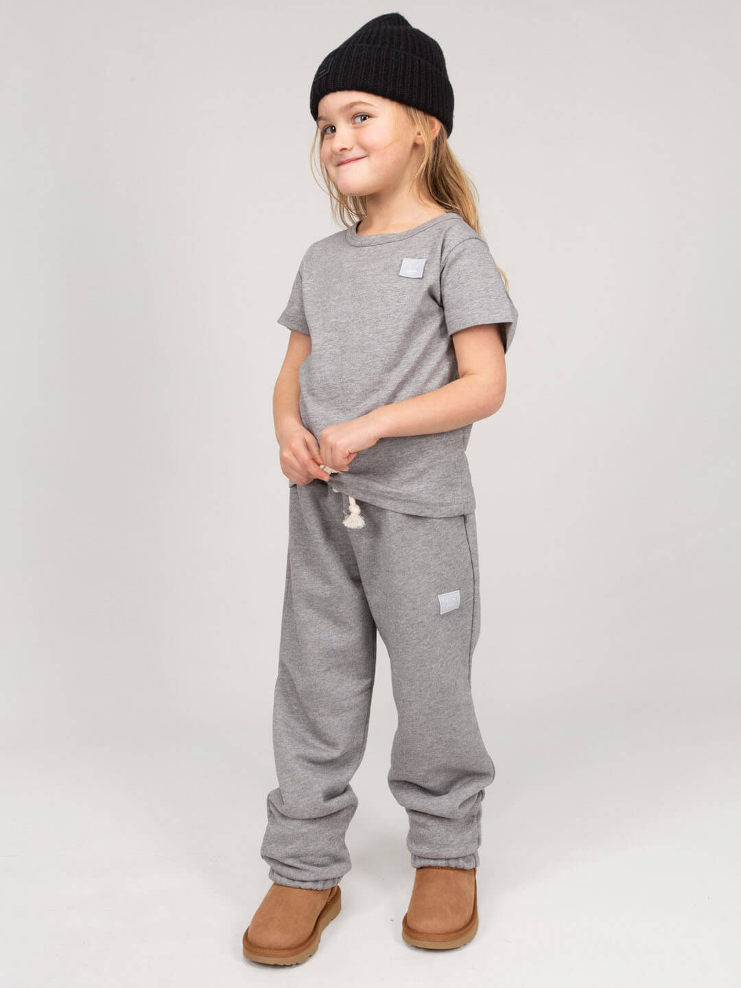 Full outfit styling with Acne Studios Face Series track pants