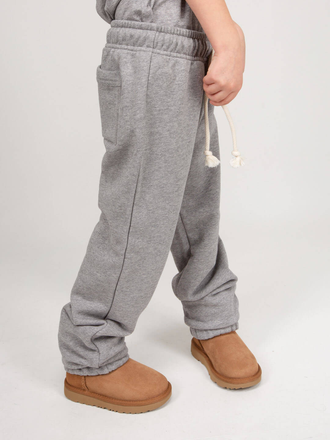 Side view showing pockets on Acne Studios Face Series sweatpants