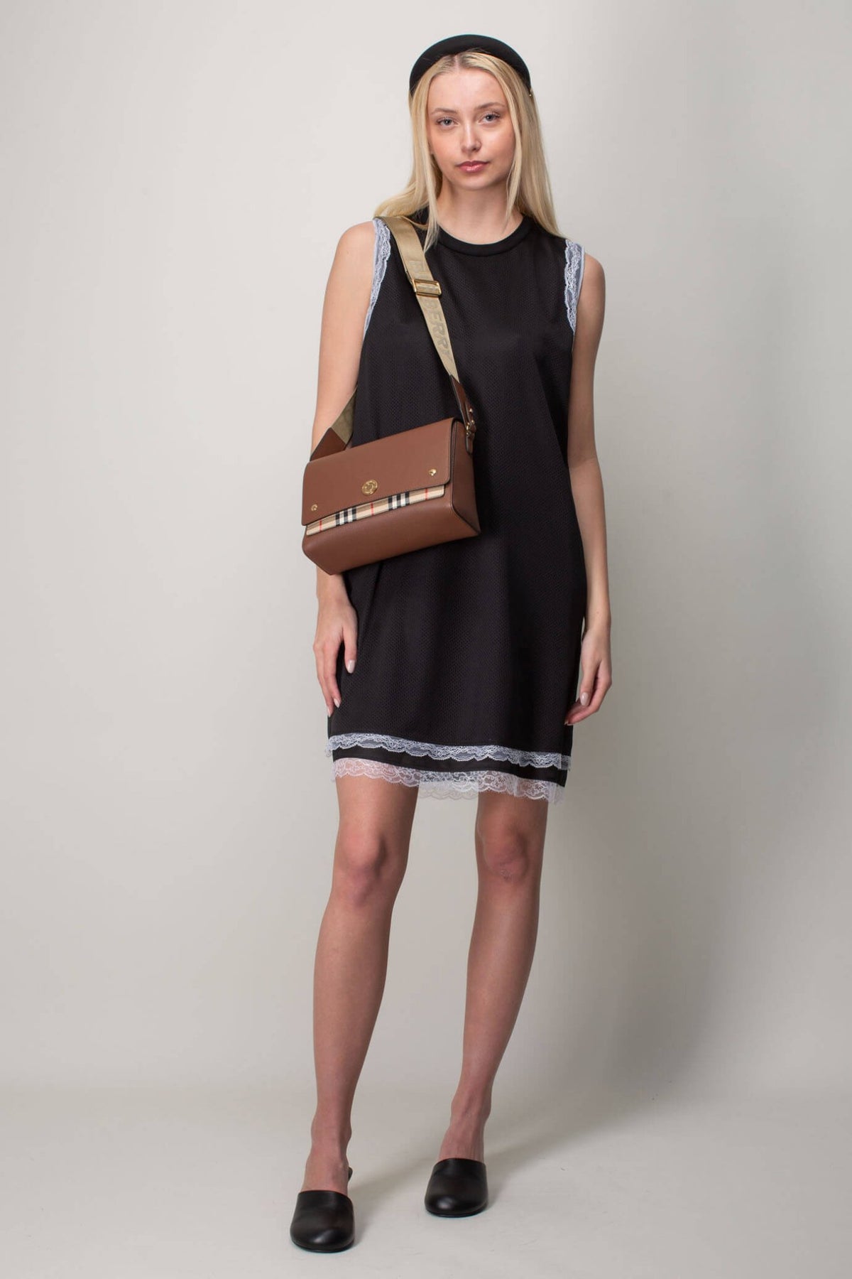 Close-up detail of premium mesh texture on Burberry dress