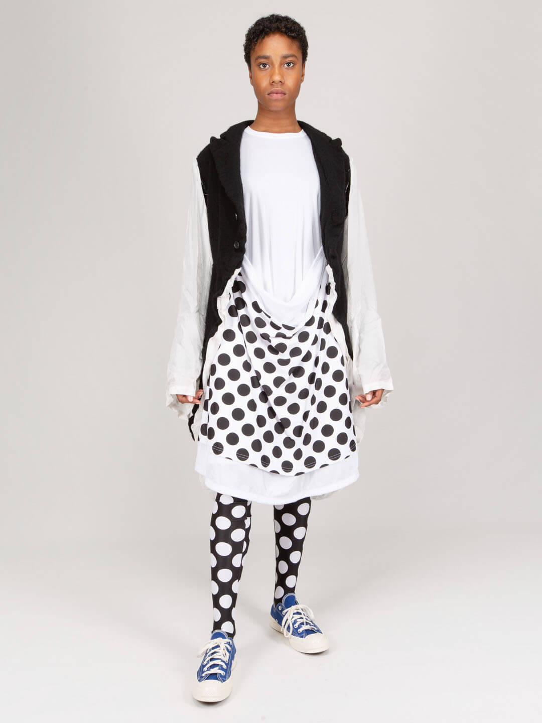 Model wearing Comme des Garçons longsleeve midi dress styled for modern elegance
