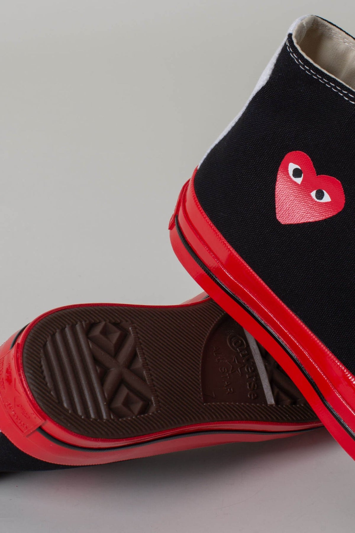 Comme des Garçons PLAY CONVERSE sneakers product styling shot