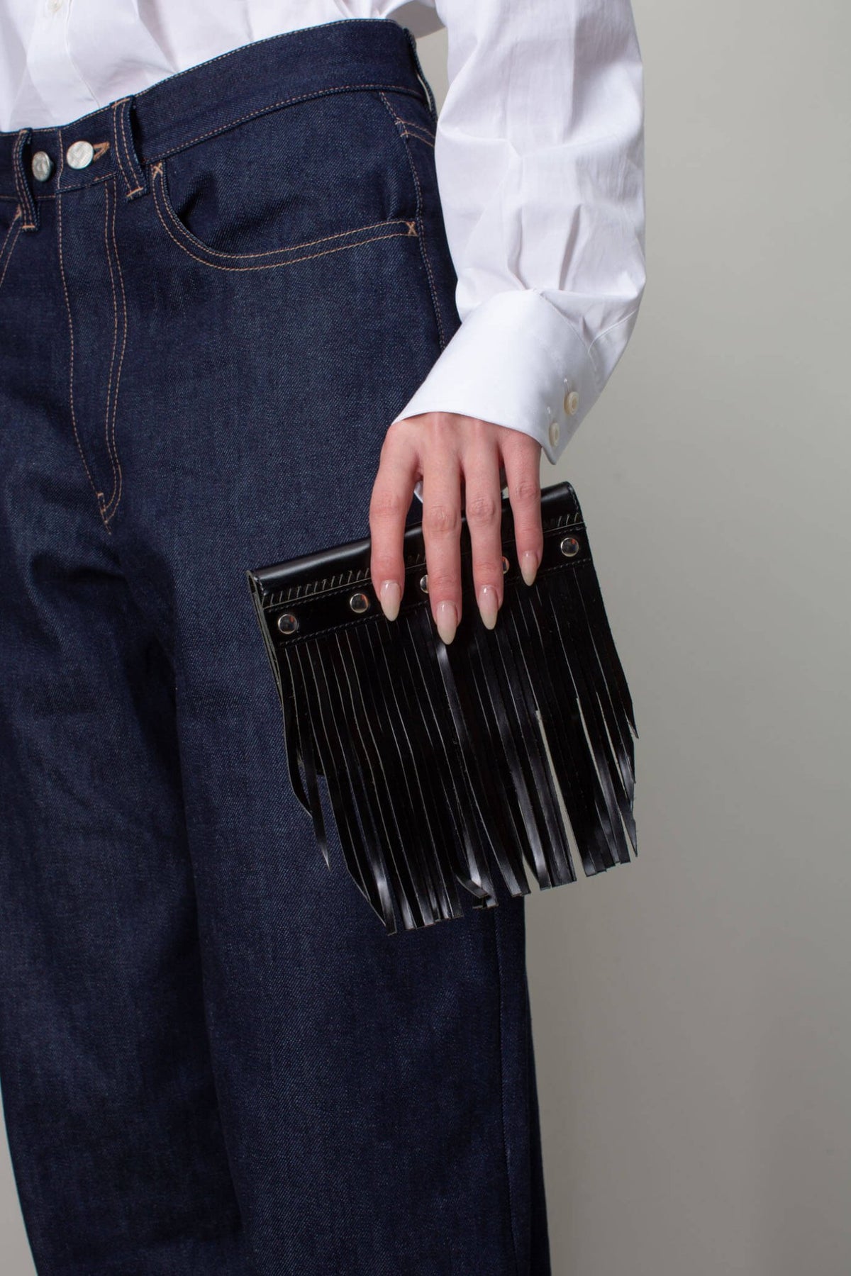 Interior view of Comme des Garçons fringe wallet compartments