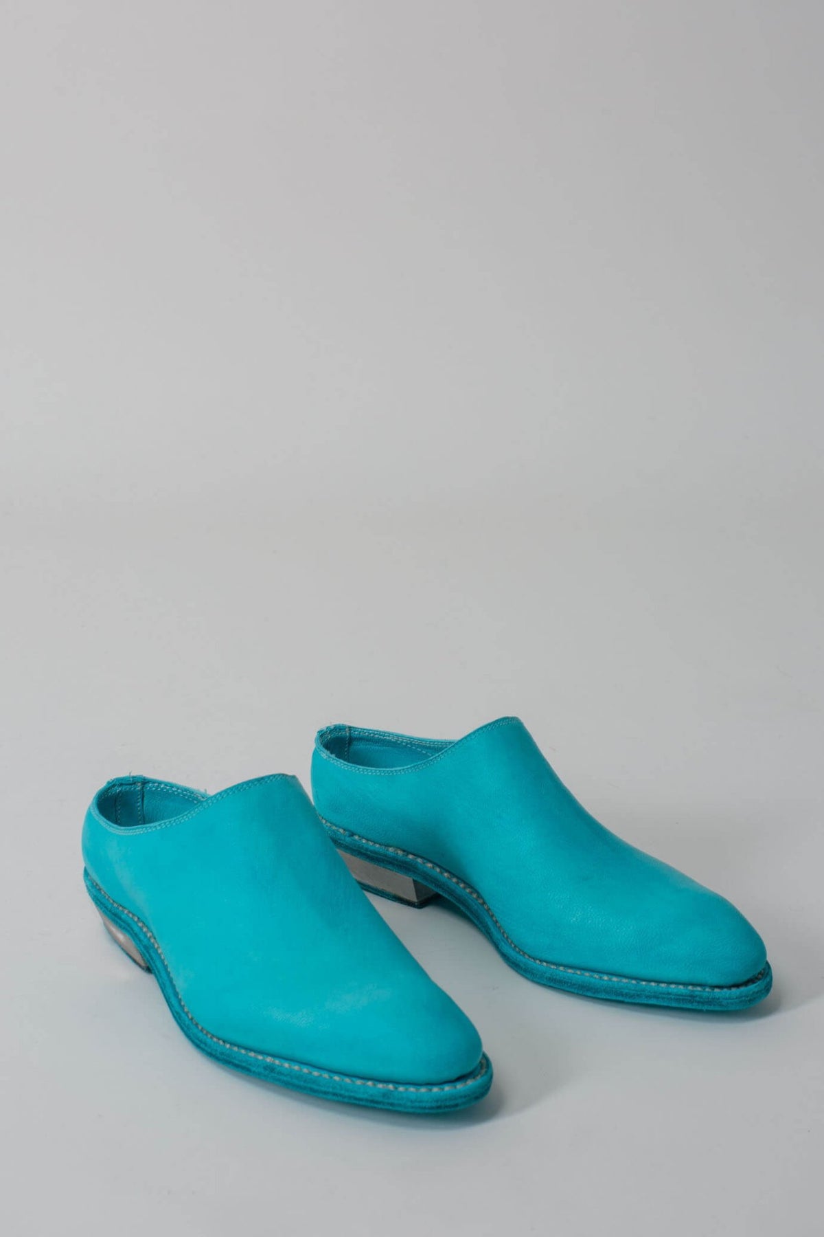 Side view of Texan Sabot flats showing architectural metal heel