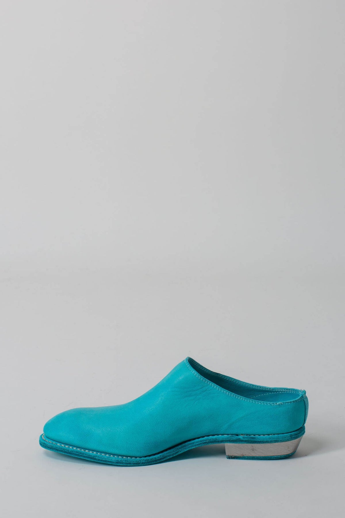 Close-up of premium goat full grain leather texture and craftsmanship