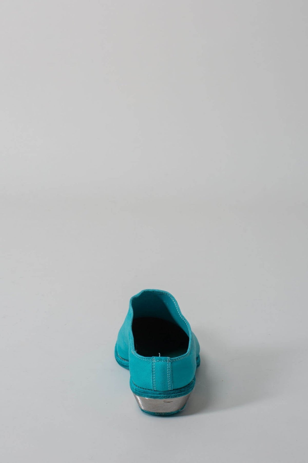 Front view highlighting the distinctive pointed toe silhouette