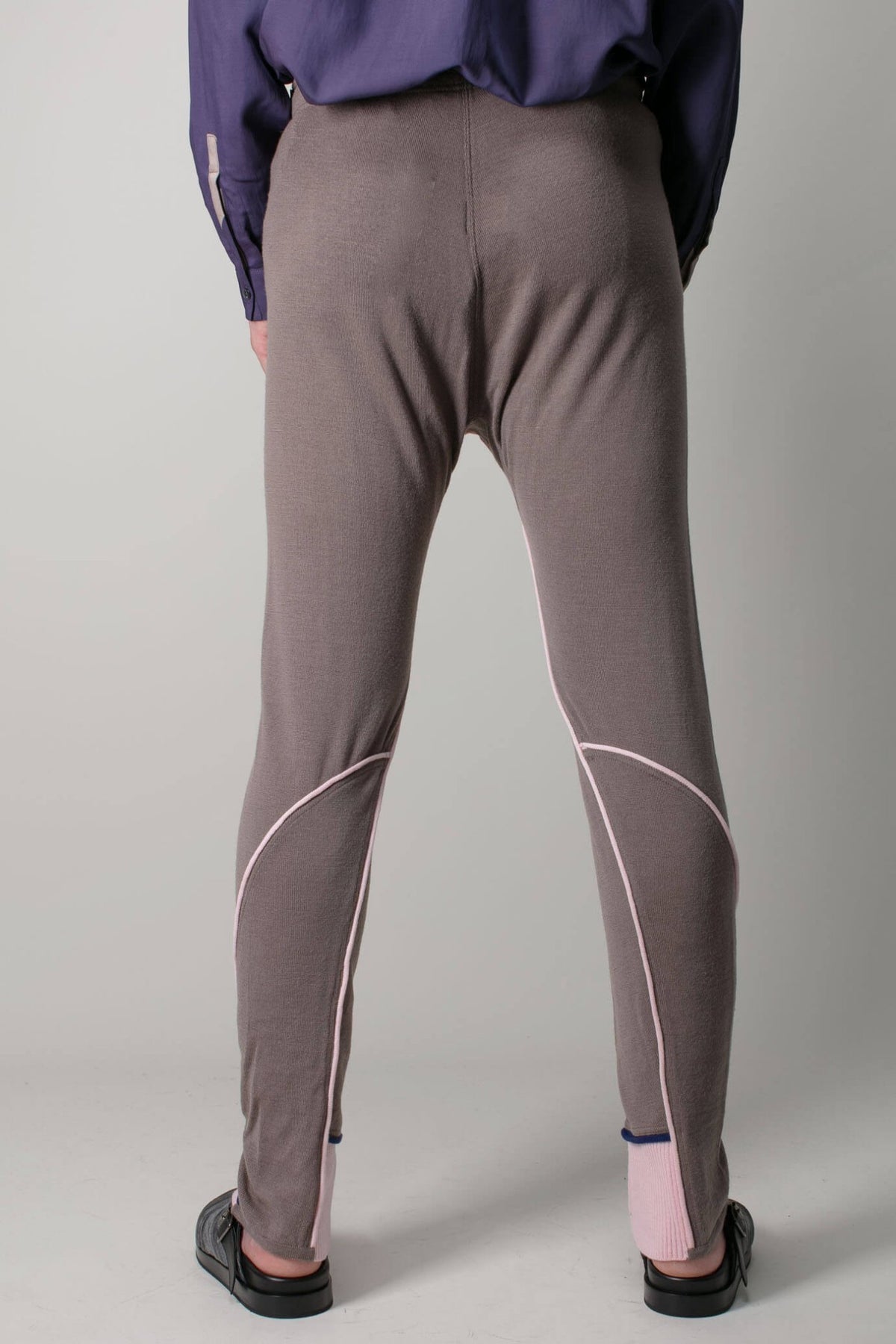 Full-length view of Cruma knit leggings showing avant-garde silhouette